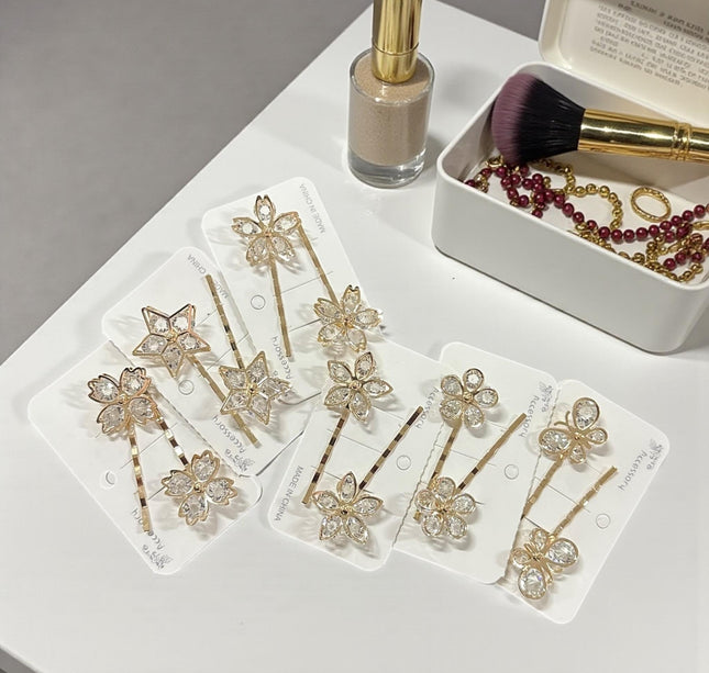 12 Pares de Pasadores Dorados con Pedrería $8.6 c/u