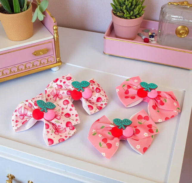 12 Moñitos Cerezas Figura $5 c/u