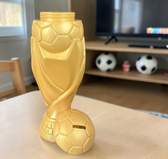 2 Alcancia "Copa Mundial" Dorada $35 c/u