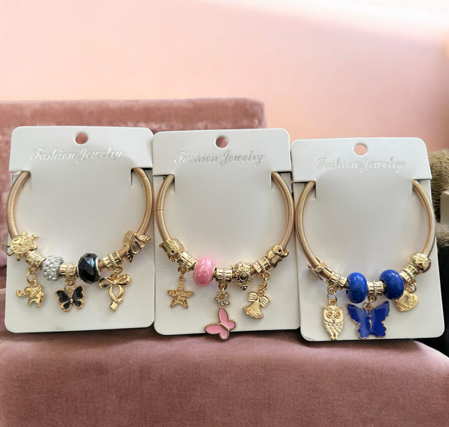 12 Pulseras tipo Pandora con Dijes de figuras $11.58 c/u