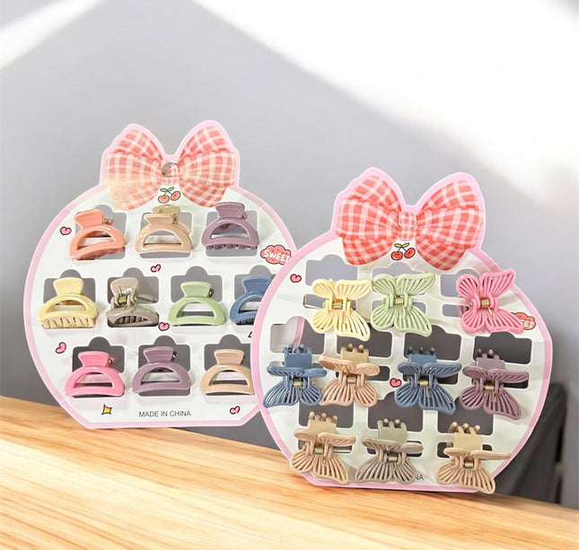 12 Sets de 10 pincitas para Cabello Figuras $12.5 c/u