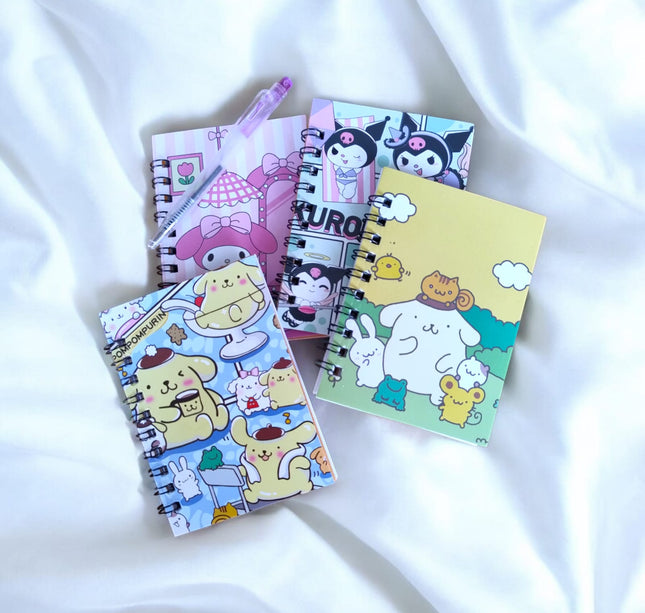 12 Libretas con Pluma Sanrio $5.49 c/u