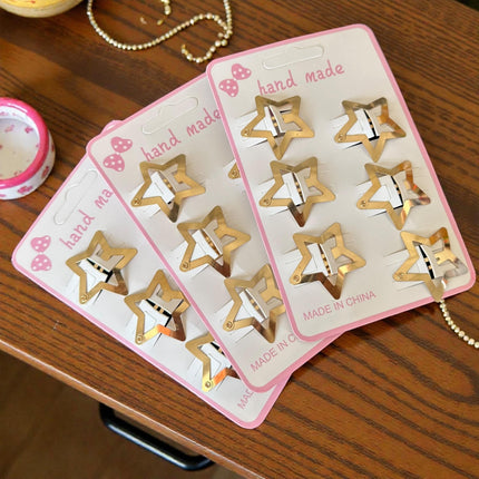 12 Sets de 6 Estrellas Cuquitas-Pasadores Doradas/Plateadas $9 c/u