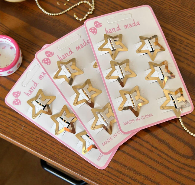 12 Sets de 6 Estrellas Cuquitas-Pasadores Doradas/Plateadas $9 c/u