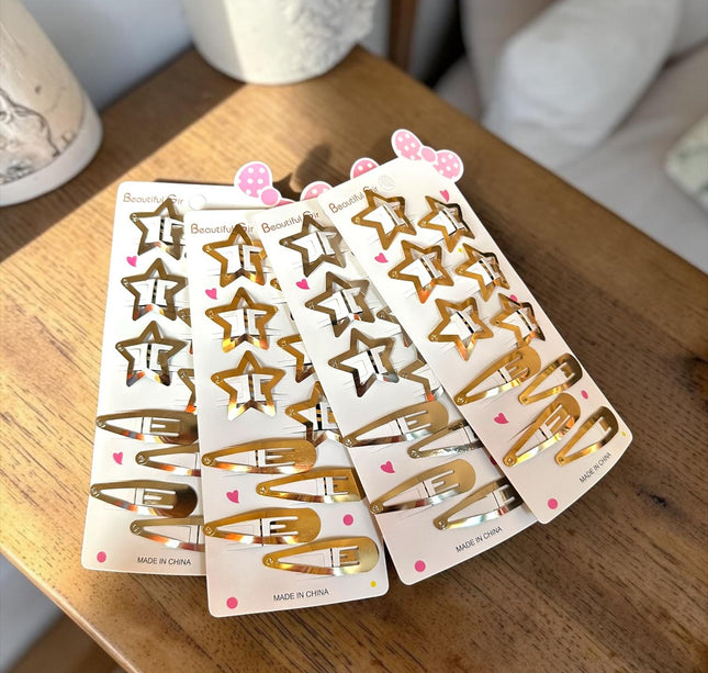 12 Sets de 6 Estrellas y 4 Pasadores Dorado/Plateado $10 c/u
