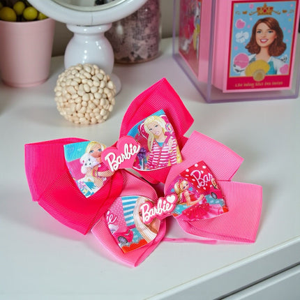 12 Moños Dobles Barbie con Figura 3D $ 7.08 c/u