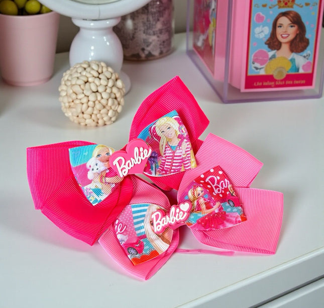 12 Moños Dobles Barbie con Figura 3D $ 7.08 c/u