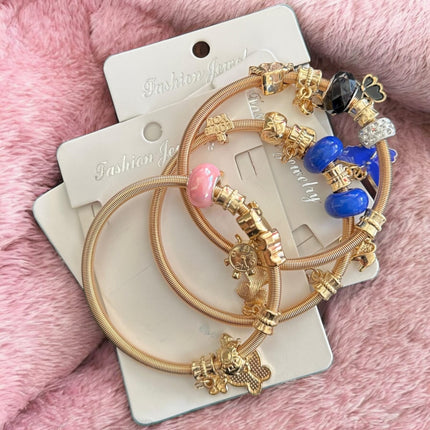 12 Pulseras tipo Pandora con Dijes de figuras $11.58 c/u