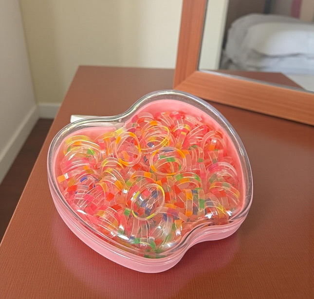 12 Estuches Manzanas con Ligas para Cabello de Colores $9.9 c/u