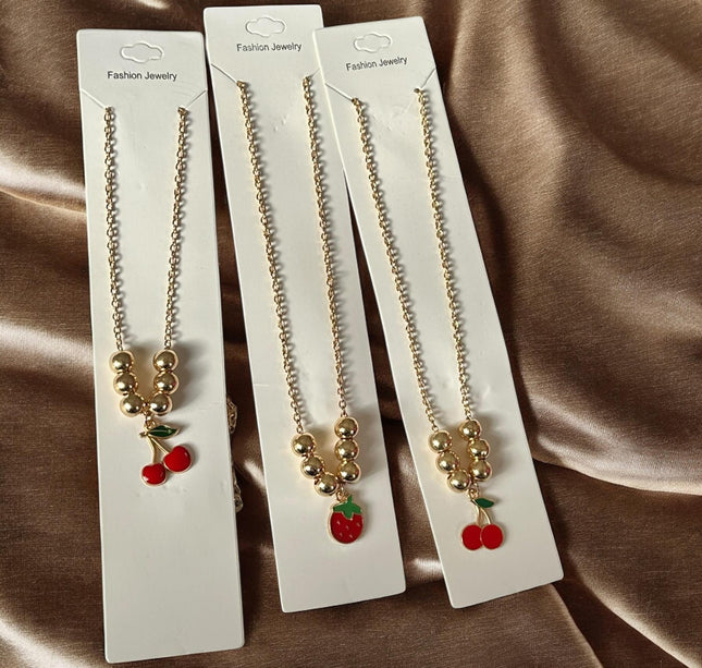 12 Collares Cerezas/Fresas Bolitas $8.3 c/u