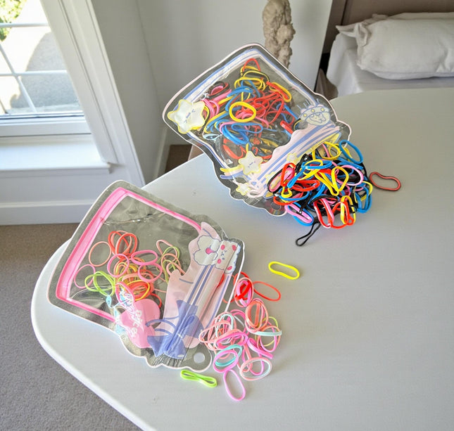 12 Bolsita de Ligas para Cabello Colores $5.9 c/u