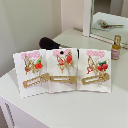 12 Pasadores Mariposa con Cereza $7.2 c/u