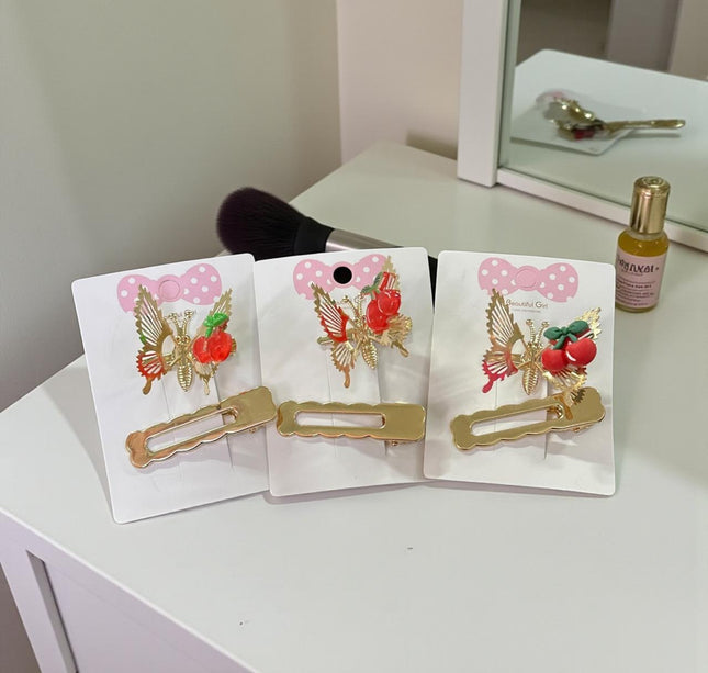 12 Pasadores Mariposa con Cereza $7.2 c/u