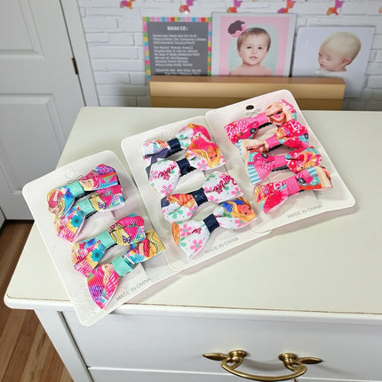 12 Sets de 4 moños barbie $8.84 c/u