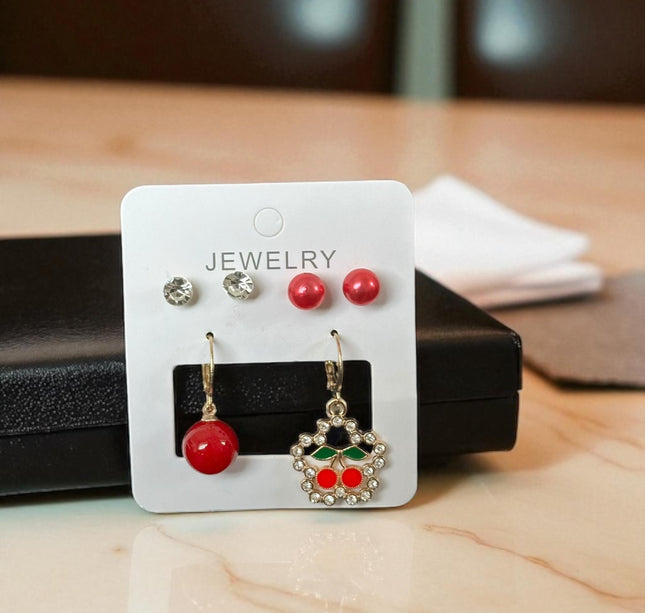 12 Sets de Aretes Cereza/ Pedreria $11.5 c/u